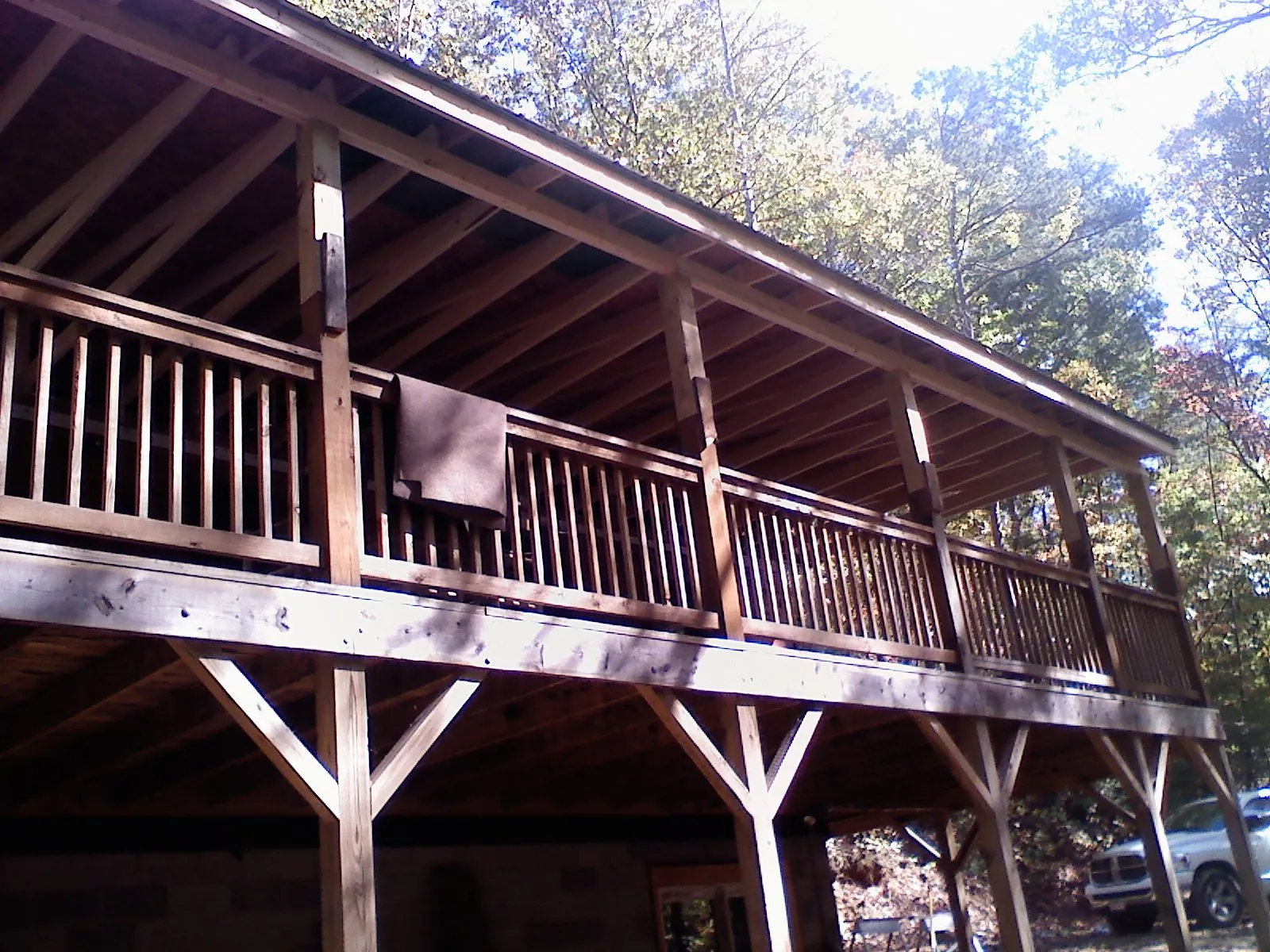 Timber framing under a new elevated porch and deck — Roof Leak Repair in Miami Beach by Roofing Brothers